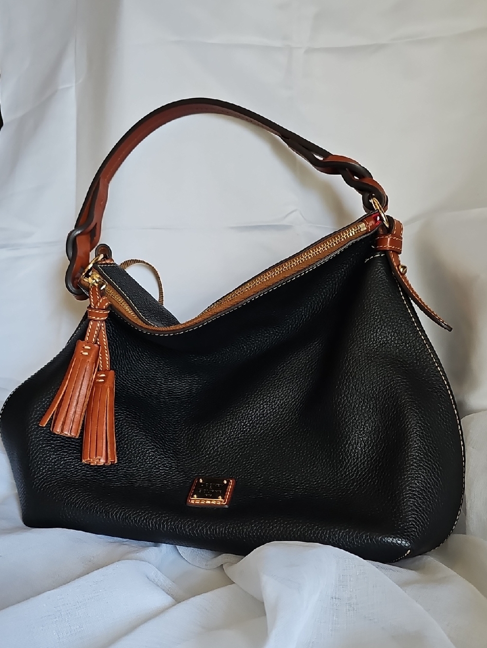 Black Leather Shoulder Bag with Brown Trim and Tassels